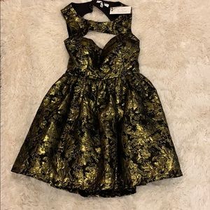 Rare London gold and black evening dress